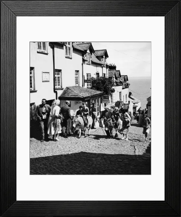 Framed Print : Mr Gulliver (left) takes a party of elderly people from the harbour of Clovelly, Devon Framed Print : Mr Gulliver (left) takes a party of elderly people from the harbour of Clovelly, Devon