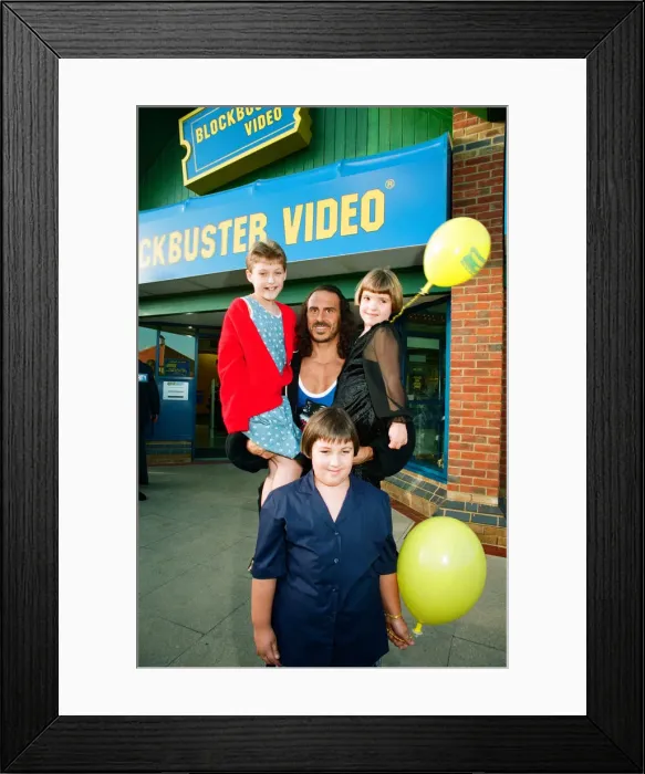 Framed Print : Wolf from Gladiators opening the new Blockbuster Video in Reading. 6th November 1994 Framed Print : Wolf from Gladiators opening the new Blockbuster Video in Reading. 6th November 1994