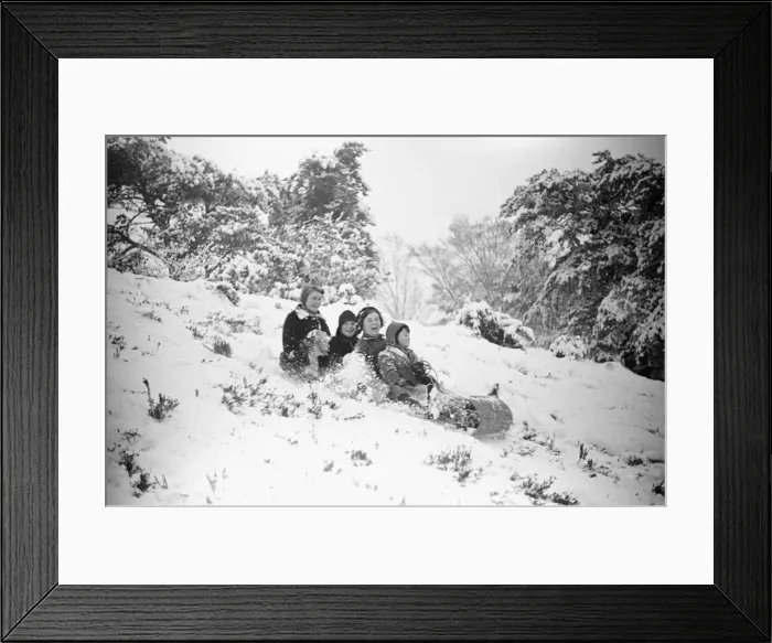 Framed Print : Children at Oxshott enjoying the winter snow. January 1939 Framed Print : Children at Oxshott enjoying the winter snow. January 1939