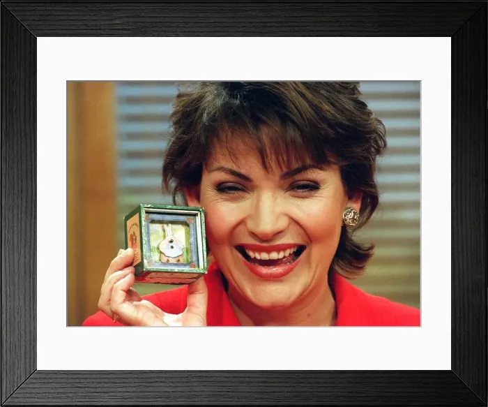 Framed Print : Lorraine Kelly with her love charm Framed Print : Lorraine Kelly with her love charm