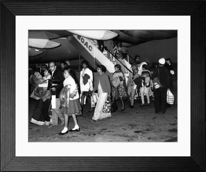 Framed Print : 160 Indian and Pakistani immigrants step down onto British soil at Heathrow Airport
