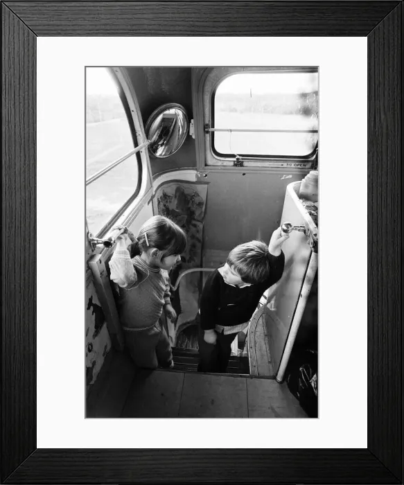 Framed Print : Children play on Woosehill Play Bus, a 1949 vintage bus, pictured 14th January 1986 Framed Print : Children play on Woosehill Play Bus, a 1949 vintage bus, pictured 14th January 1986