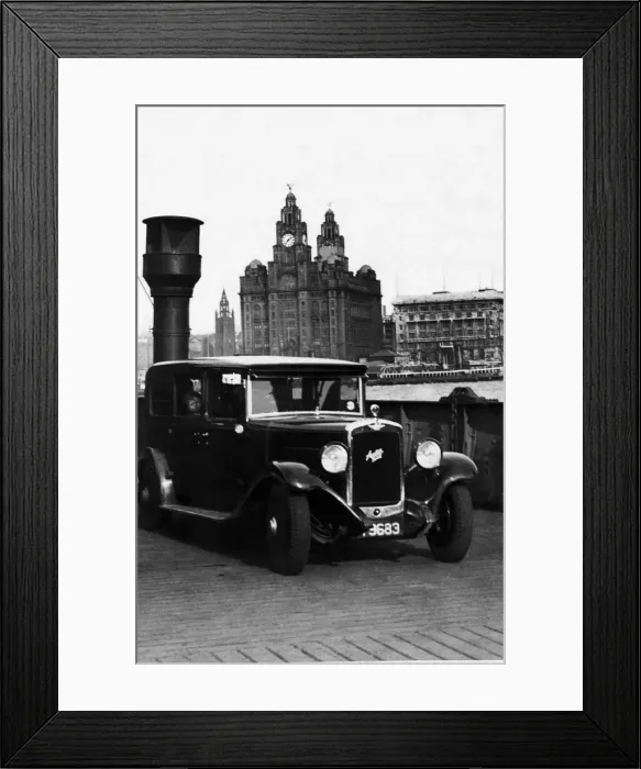 Framed Print : An Austin motor car crossing the River Mersey on a luggage boat in Liverpool