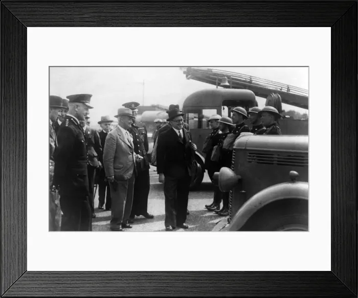 Framed Print : A local mayor inspecting an auxiliary fire fighting crew. Circa 1940