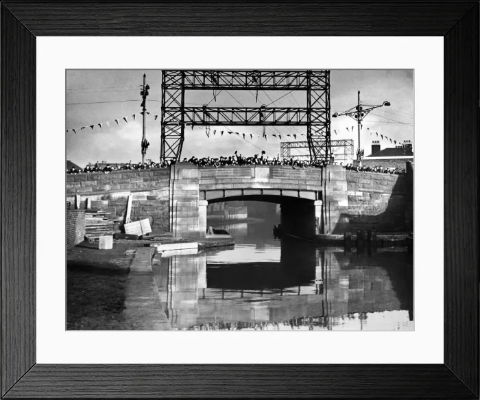 Framed Print : A scene of people on a bridge celebrating the coronation of King George VI Framed Print : A scene of people on a bridge celebrating the coronation of King George VI