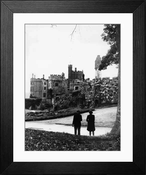 Framed Print : Visitor looking out towards Ruthin Castle near the town of Ruthin in the Vale of Clwyd