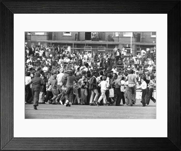 Framed Print : England v West Indies 26th July 1973 Clive Lloyd towers over a crowd of young fans Framed Print : England v West Indies 26th July 1973 Clive Lloyd towers over a crowd of young fans
