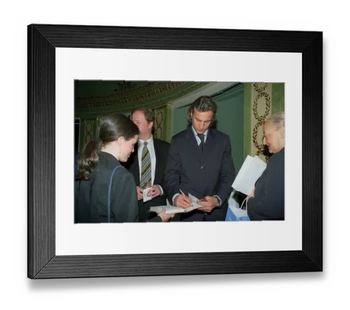 Framed Print : David Ginola footballer signs autographs for his fans May 1999 at the Dorchester