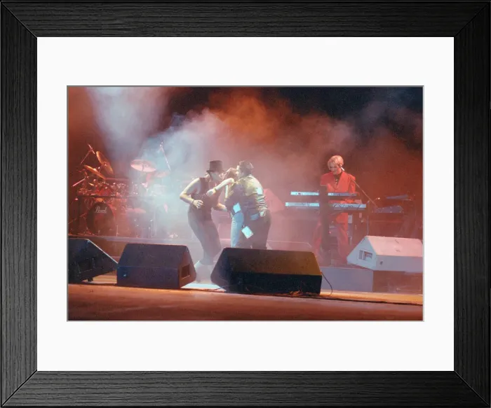 Framed Print : Duran Duran in concert. A fan approached the stage Framed Print : Duran Duran in concert. A fan approached the stage