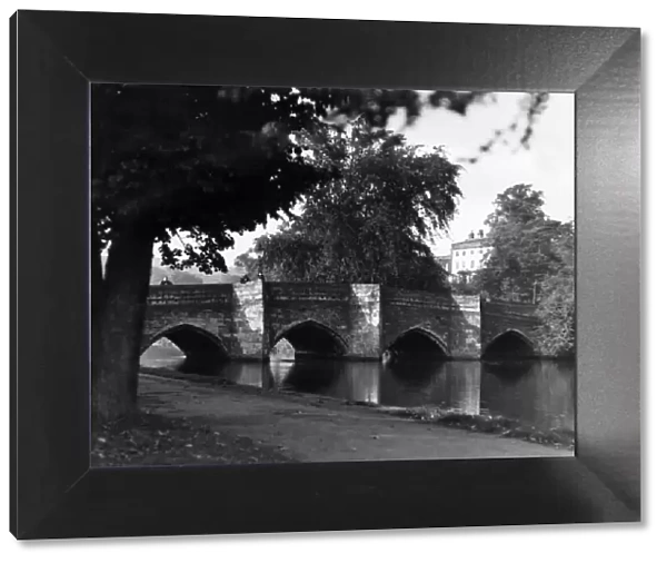View of the old bridge which crosses the River Wye in Bakewell, Derbyshire