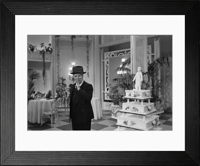 Framed Print : Actor and director Charlie Chaplin legend of the silent movies celebrates his 77th Framed Print : Actor and director Charlie Chaplin legend of the silent movies celebrates his 77th