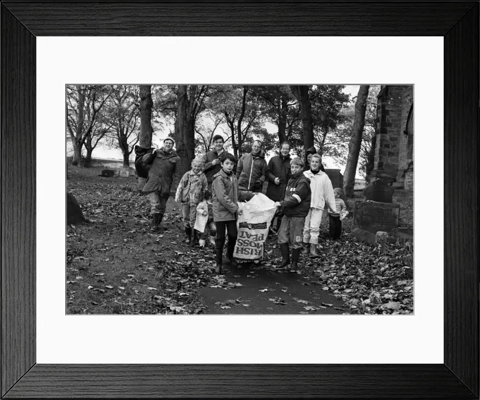 Framed Print : A team of volunteers made sure that was where all the rubbish went during a clean -up of Framed Print : A team of volunteers made sure that was where all the rubbish went during a clean -up of