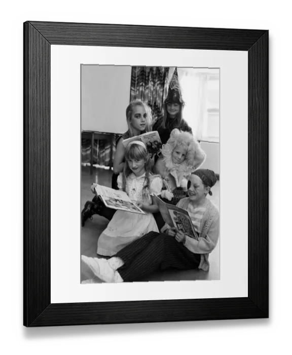 Framed Print : Children and staff at Linthwaite Church School dressed up as their favourite children