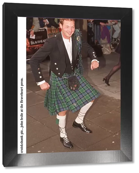 John Leslie at the premiere of the film Braveheart wearing tartan kilt Highland dress