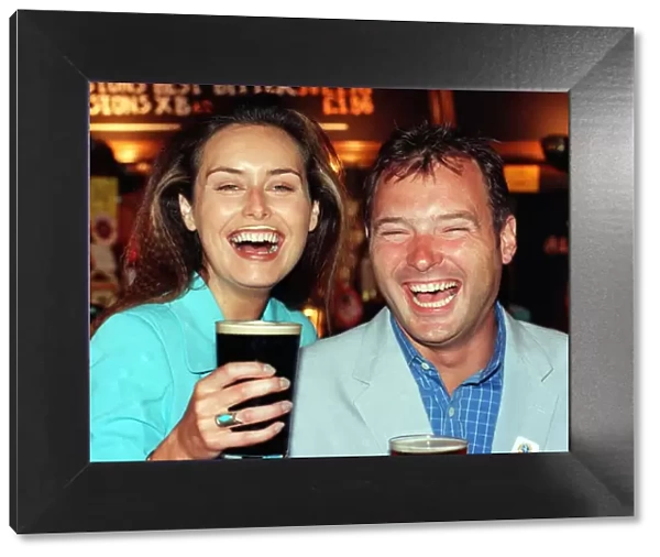 MODEL EILEEN CATTERSON AND TV PRESENTER JOHN LESLIE HAVING SOME FUN AT THE LAUNCH OF