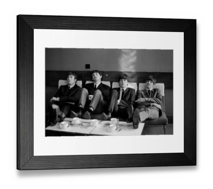 Framed Print : The Beatles relax during rehearsals at The Prince of Wales Theatre in London for
