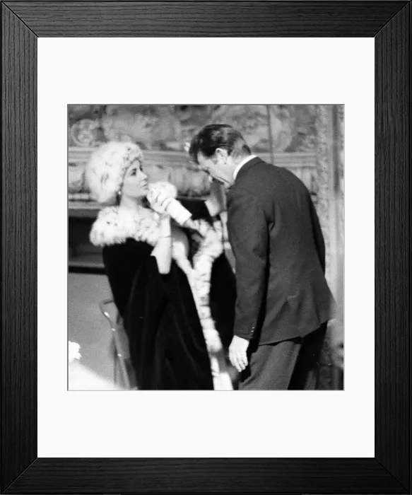 Framed Print : Elizabeth Taylor and Richard Burton on the television set where Richard is filming a Framed Print : Elizabeth Taylor and Richard Burton on the television set where Richard is filming a