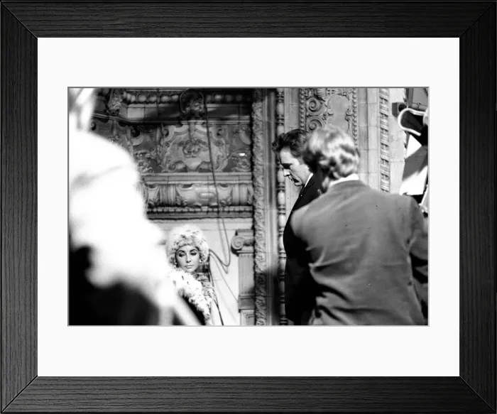 Framed Print : Elizabeth Taylor and Richard Burton on the television set where Richard is filming a