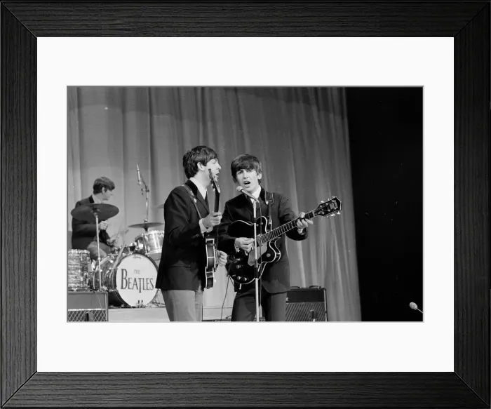 Framed Print : Picture shows Paul McCartney (left) and George Harrison (right) sharing the microphone Framed Print : Picture shows Paul McCartney (left) and George Harrison (right) sharing the microphone