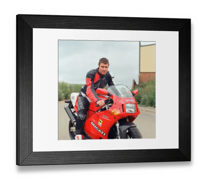 Framed Print : Simon Le Bon from Duran Duran on a Ducati Motobike. It is not clear if this is