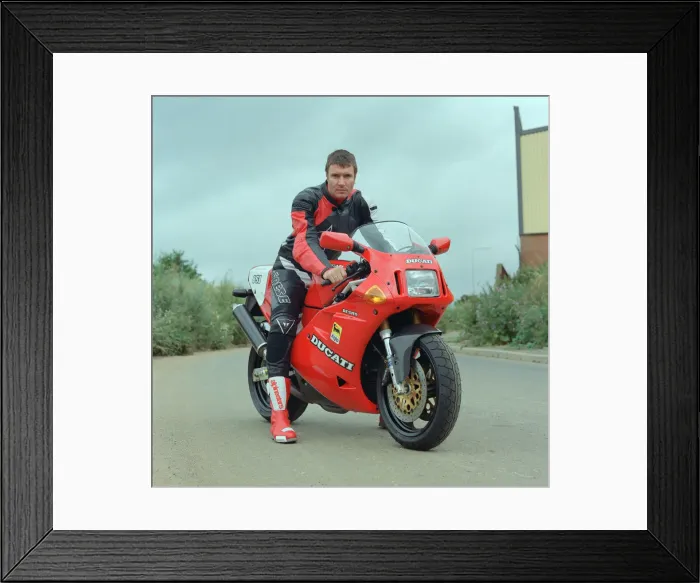 Framed Print : Simon Le Bon from Duran Duran on a Ducati Motobike. It is not clear if this is