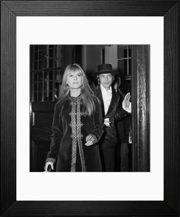 Framed Print : Lead singer of The Rolling Stones pop group Mick Jagger with Marianne Faithful arriving Framed Print : Lead singer of The Rolling Stones pop group Mick Jagger with Marianne Faithful arriving