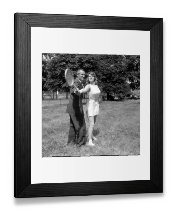 Framed Print : Fred Perry with actress Yvonne Buckingham, during a coaching session