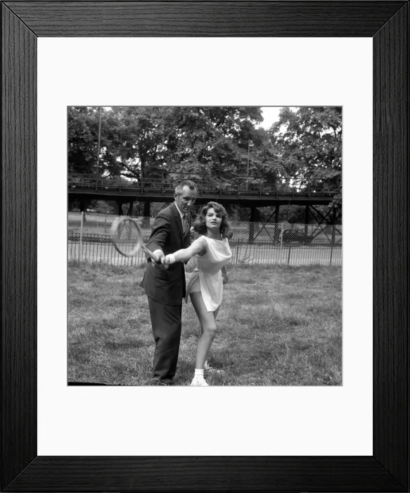 Framed Print : Fred Perry with actress Yvonne Buckingham, during a coaching session