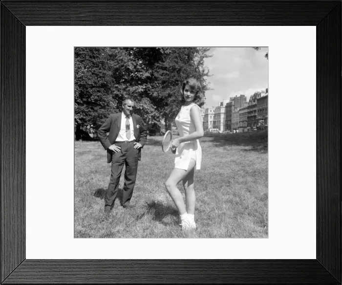 Framed Print : Fred Perry with actress Yvonne Buckingham, during a coaching session Framed Print : Fred Perry with actress Yvonne Buckingham, during a coaching session