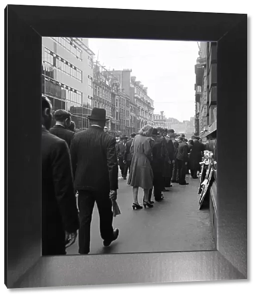 A street scene in London. Circa 1953