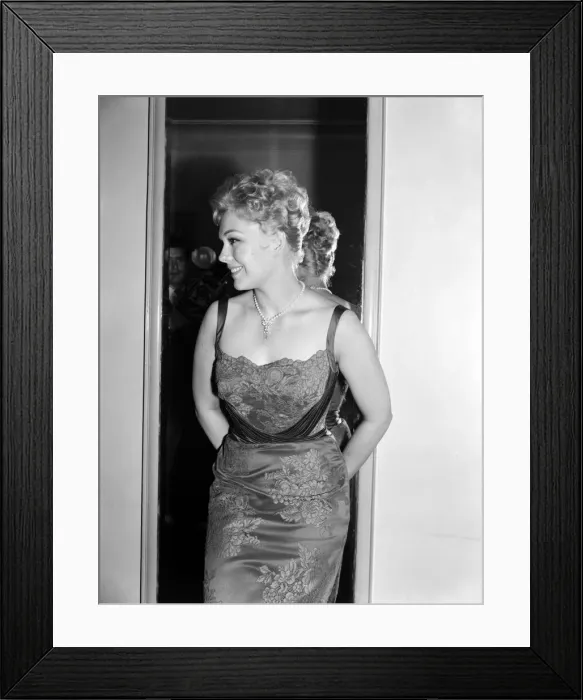 Framed Print : Kim Novak attends the premiere of the Middle of the Night. June 1959 Framed Print : Kim Novak attends the premiere of the Middle of the Night. June 1959