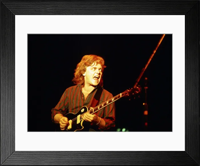 Framed Print : Canadian rock band Saga in concert at Hammersmith Odeon. Guitarist Ian Crichton Framed Print : Canadian rock band Saga in concert at Hammersmith Odeon. Guitarist Ian Crichton