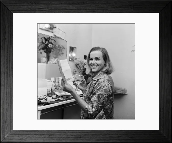 Framed Print : Actress Honor Blackman reads telegrams of congratulations in her dressing room Framed Print : Actress Honor Blackman reads telegrams of congratulations in her dressing room
