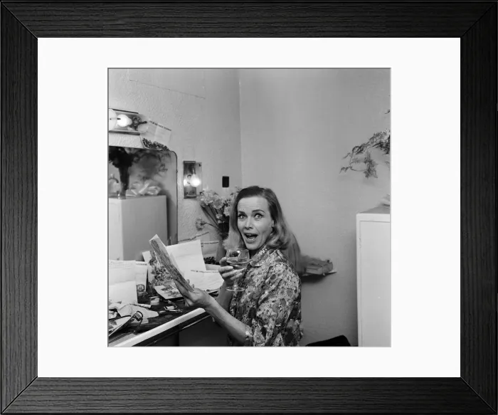 Framed Print : Actress Honor Blackman reads telegrams of congratulations in her dressing room Framed Print : Actress Honor Blackman reads telegrams of congratulations in her dressing room