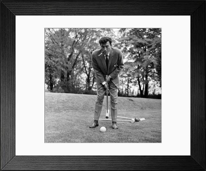 Framed Print : Laurence Harvey has a quick game of croquet on the lawn of the house in Priesthorpe Lane Framed Print : Laurence Harvey has a quick game of croquet on the lawn of the house in Priesthorpe Lane
