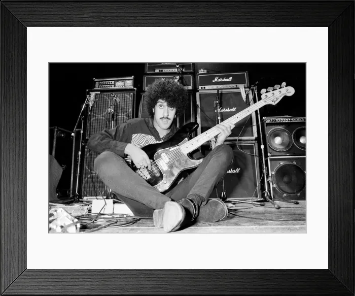 Framed Print : Phil Lynott of Thin Lizzy during a recording session for the groups new album Framed Print : Phil Lynott of Thin Lizzy during a recording session for the groups new album