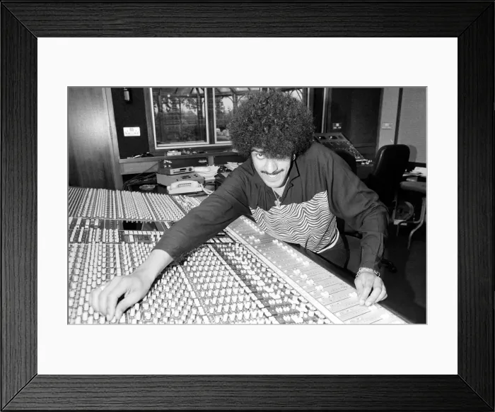 Framed Print : Phil Lynott of Thin Lizzy during a recording session for the groups new album Framed Print : Phil Lynott of Thin Lizzy during a recording session for the groups new album