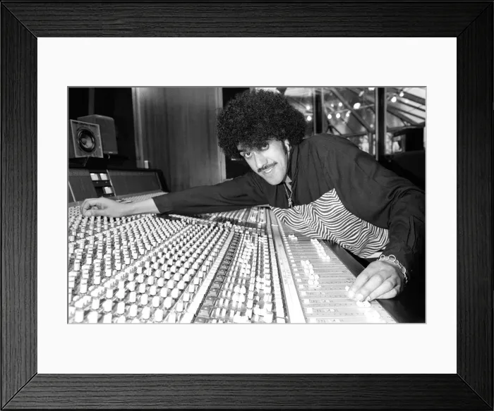 Framed Print : Phil Lynott of Thin Lizzy during a recording session for the groups new album Framed Print : Phil Lynott of Thin Lizzy during a recording session for the groups new album