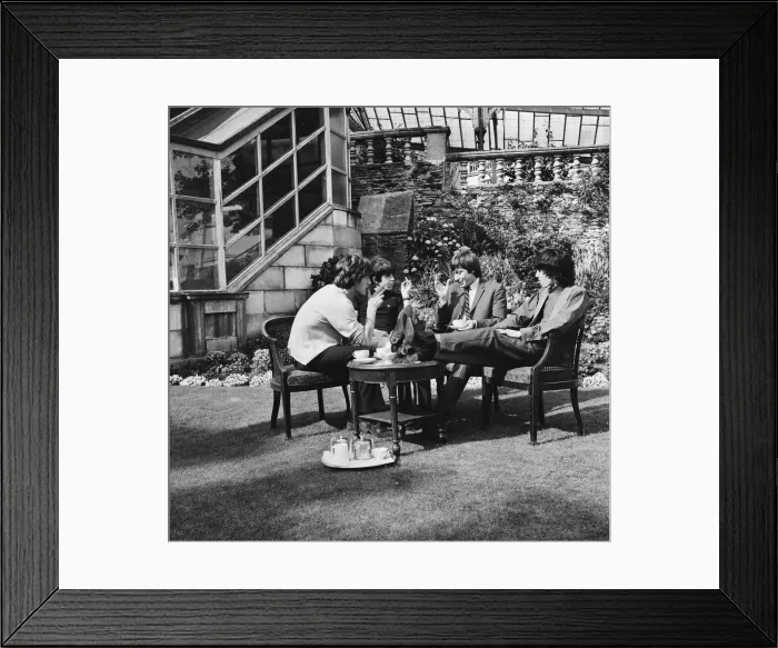 Framed Print : The Rolling Stones having a cup of tea in their hotel garden at Douglas Framed Print : The Rolling Stones having a cup of tea in their hotel garden at Douglas