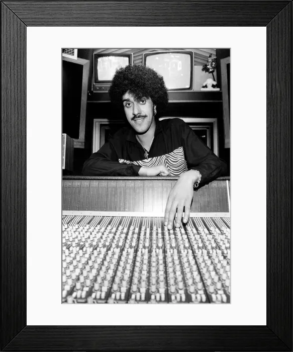 Framed Print : Phil Lynott of Thin Lizzy during a recording session for the groups new album Framed Print : Phil Lynott of Thin Lizzy during a recording session for the groups new album