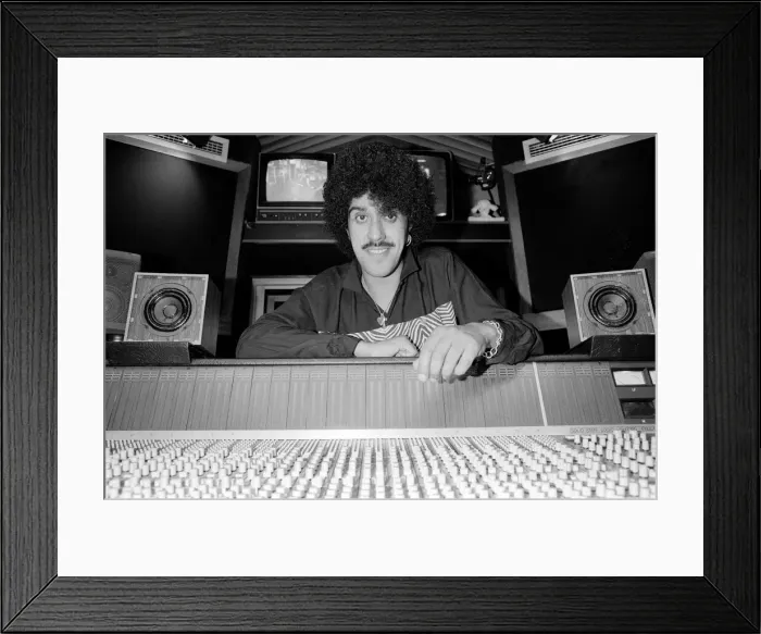 Framed Print : Phil Lynott of Thin Lizzy during a recording session for the groups new album Framed Print : Phil Lynott of Thin Lizzy during a recording session for the groups new album