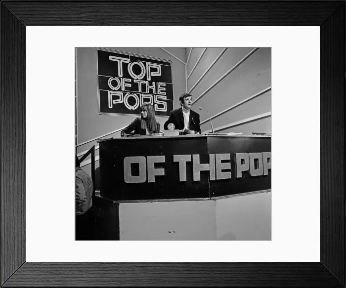 Framed Print : Alan Freeman, (black jacket, white roll neck sweater, sitting behind the microphone Framed Print : Alan Freeman, (black jacket, white roll neck sweater, sitting behind the microphone