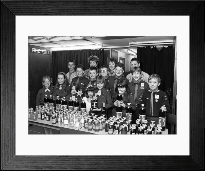 Framed Print : We ve got a lot of bottle... Scouts, Guides and Brownies man the bottle stall