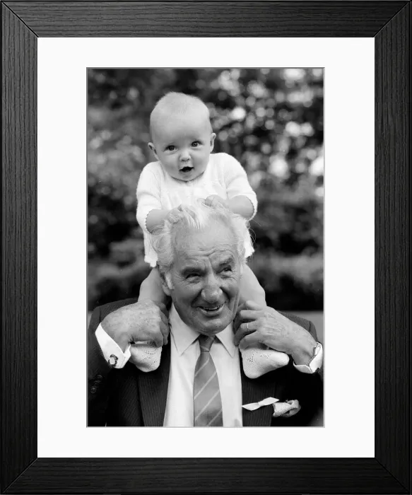 Framed Print : Fred Perry, former Wimbledon 3 times champion, with his grandson John Perry Framed Print : Fred Perry, former Wimbledon 3 times champion, with his grandson John Perry