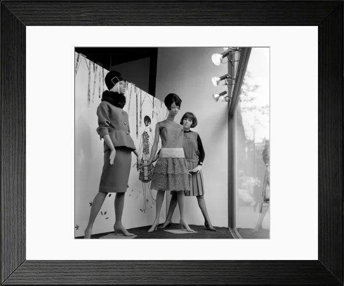 Framed Print : Mary Quant, clothes designer, standing inside the window of her fashion shop Bazaar