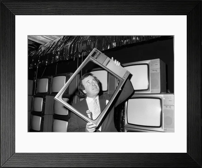 Framed Print : Terry Wogan was given 100 new TV sets today. They are being presented by Phillips the TV Framed Print : Terry Wogan was given 100 new TV sets today. They are being presented by Phillips the TV