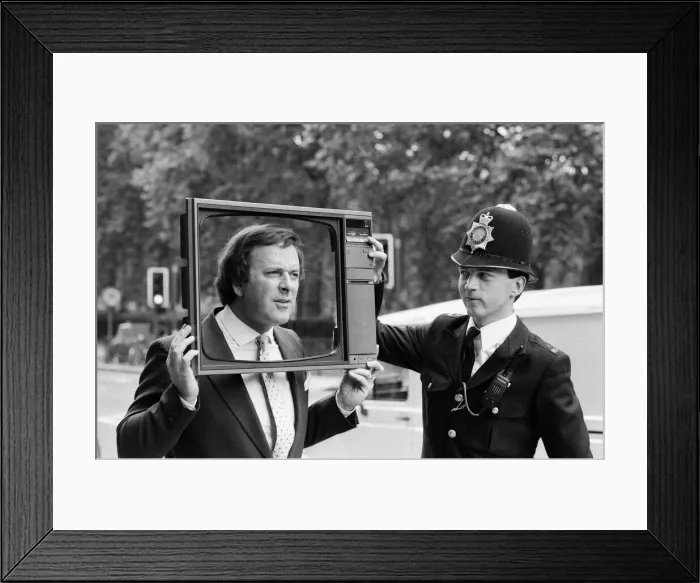 Framed Print : Terry Wogan was given 100 new TV sets today. They are being presented by Phillips the TV Framed Print : Terry Wogan was given 100 new TV sets today. They are being presented by Phillips the TV