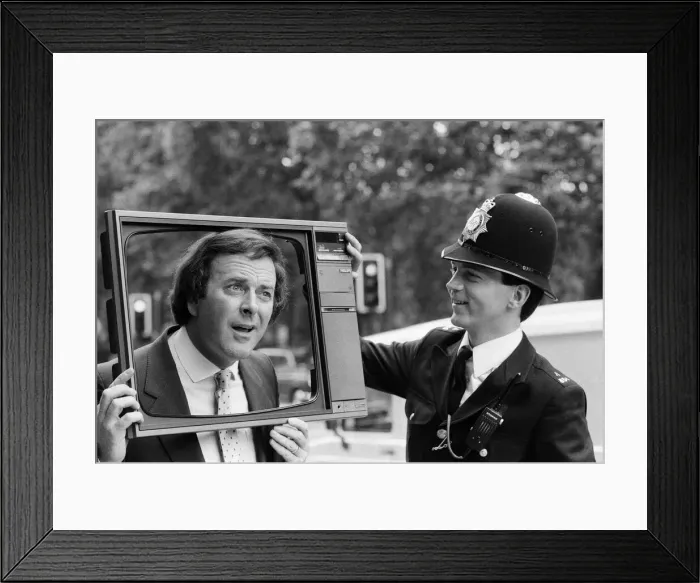 Framed Print : Terry Wogan was given 100 new TV sets today. They are being presented by Phillips the TV Framed Print : Terry Wogan was given 100 new TV sets today. They are being presented by Phillips the TV