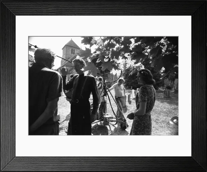 Framed Print : Director John Sturges (left) seen here in conversation with Donald Sutherland while Framed Print : Director John Sturges (left) seen here in conversation with Donald Sutherland while