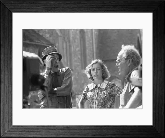Framed Print : Director John Sturges (right) seen here in conversation with Donald Sutherland while Framed Print : Director John Sturges (right) seen here in conversation with Donald Sutherland while